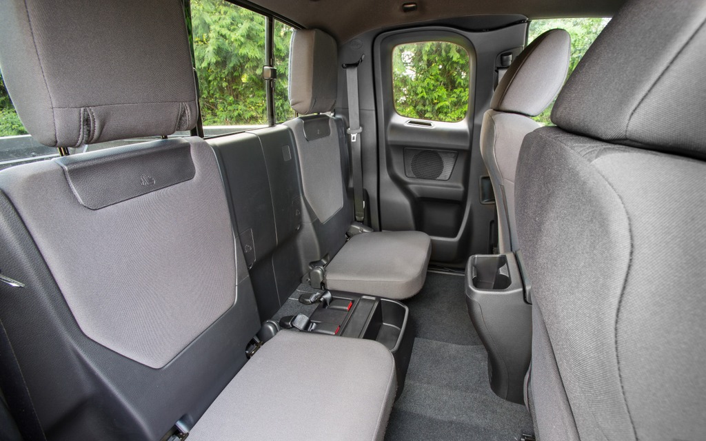The extended cab still has foldable seats.