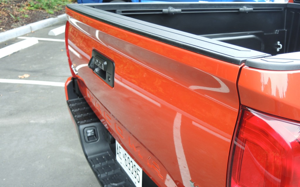 The tailgate features an integrated spoiler.