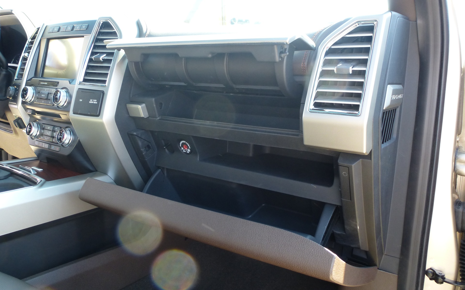 Double glove box with one locking compatment