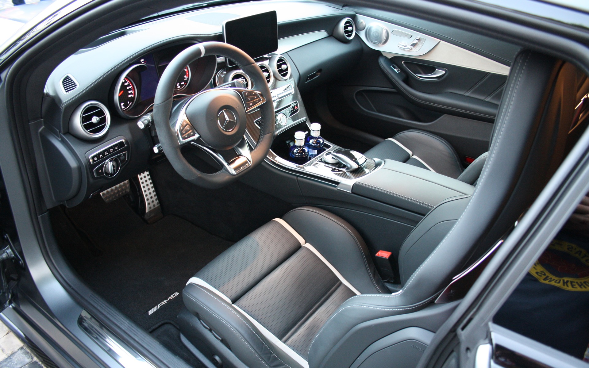 The C 63 boasts a beautifully crafted cockpit with bolstered sport seats.