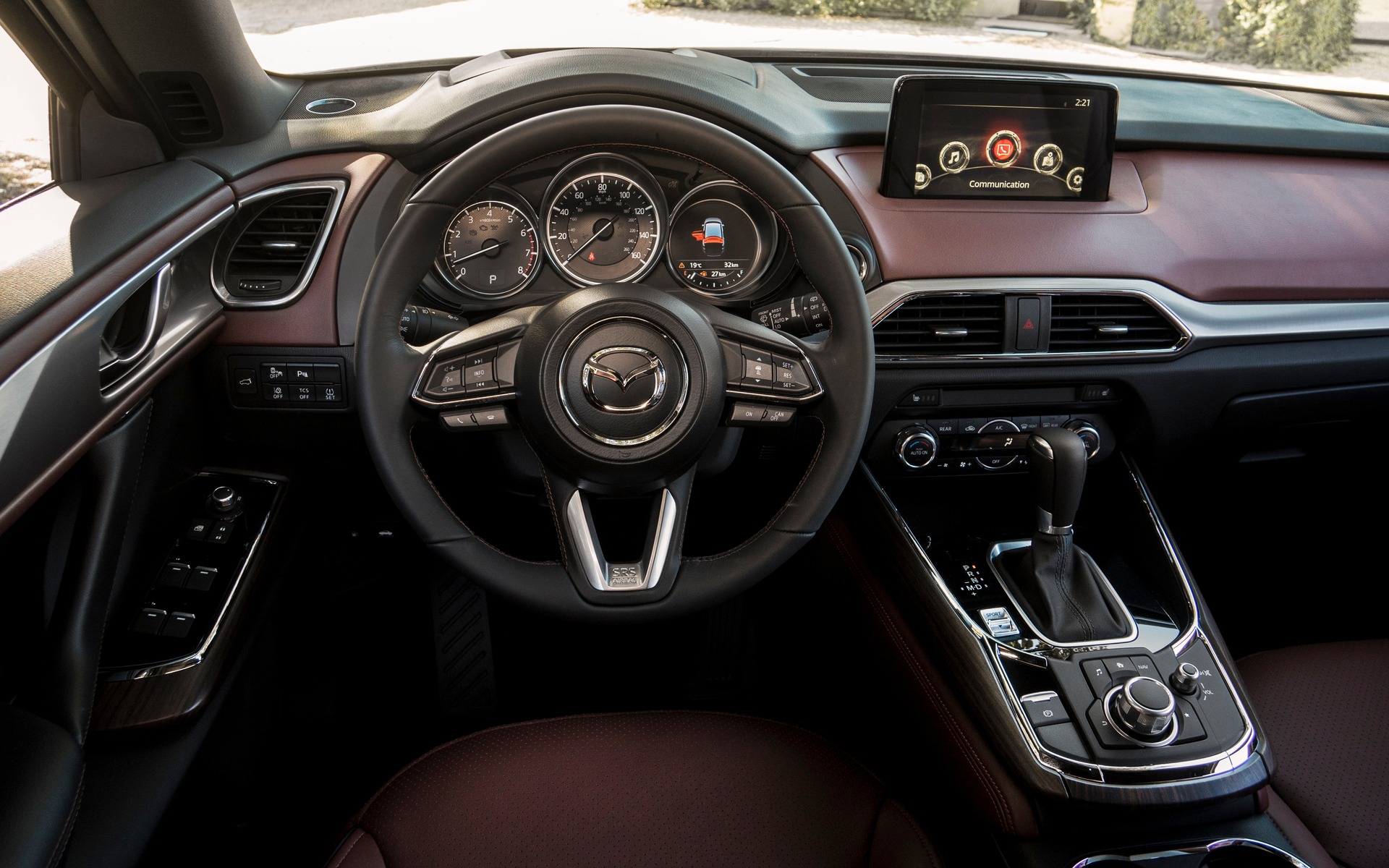 The 2016 Mazda CX-9's dashboard is angled towards the driver.
