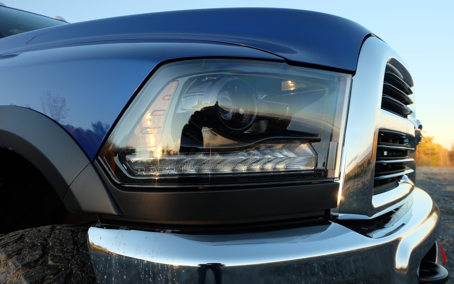 The 2015 RAM Power Wagon gets projector headlights with black housings.