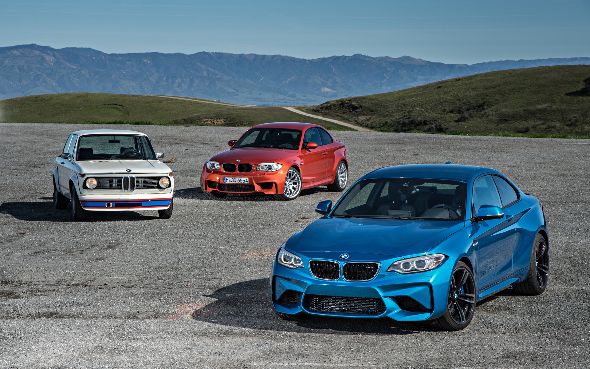 Front left to right: BMW 2002 Turbo, BMW 1 Series M Coupé and BMW M2.