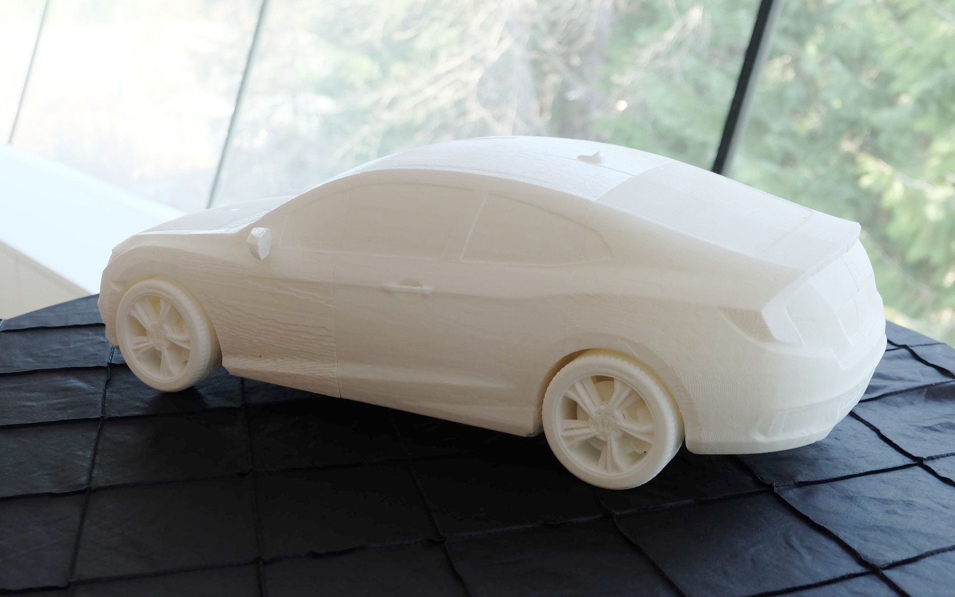 A 3D-printed scale model of the 2016 Honda Civic Coupe.