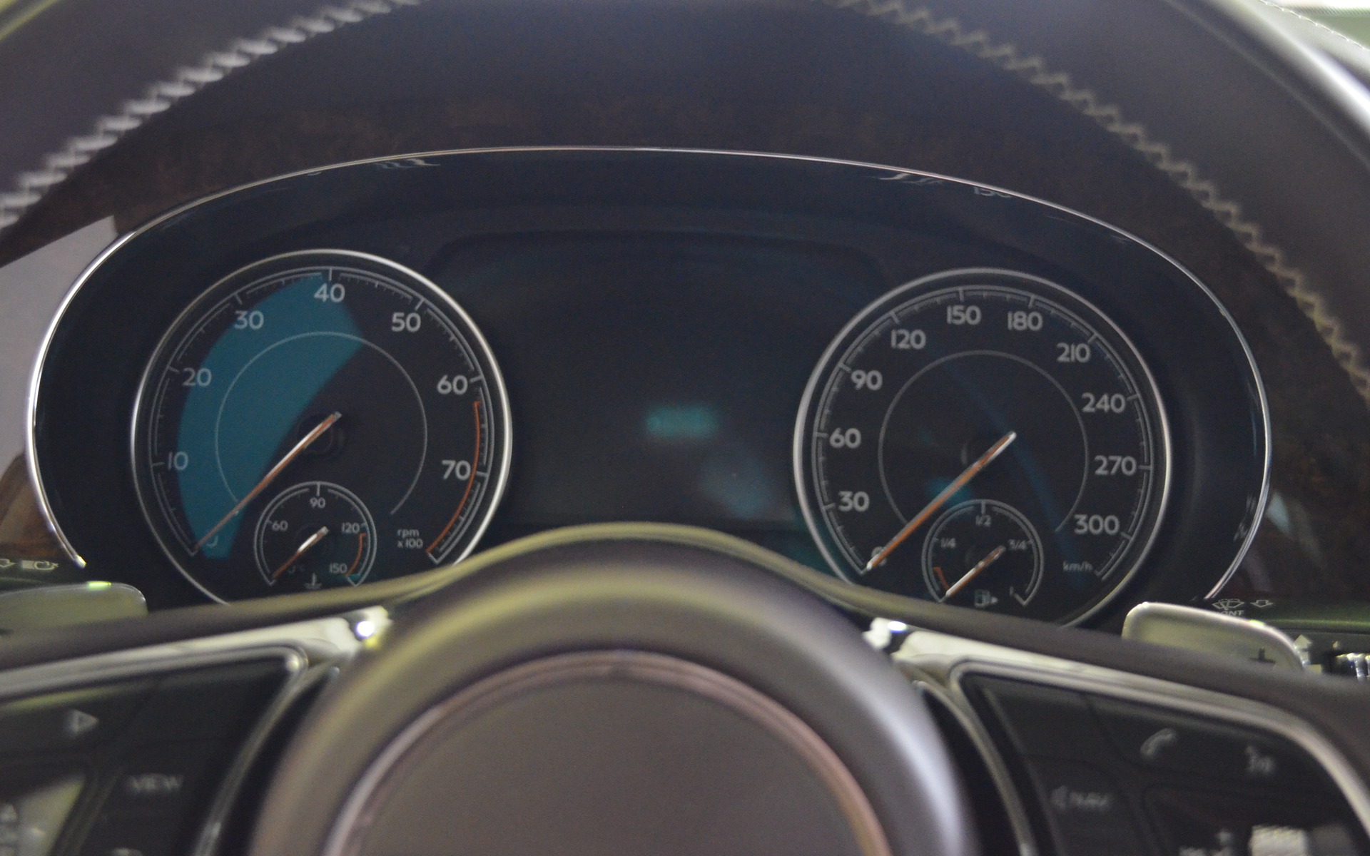 The 2017 Bentley Bentayga's gauges are charmingly simple.
