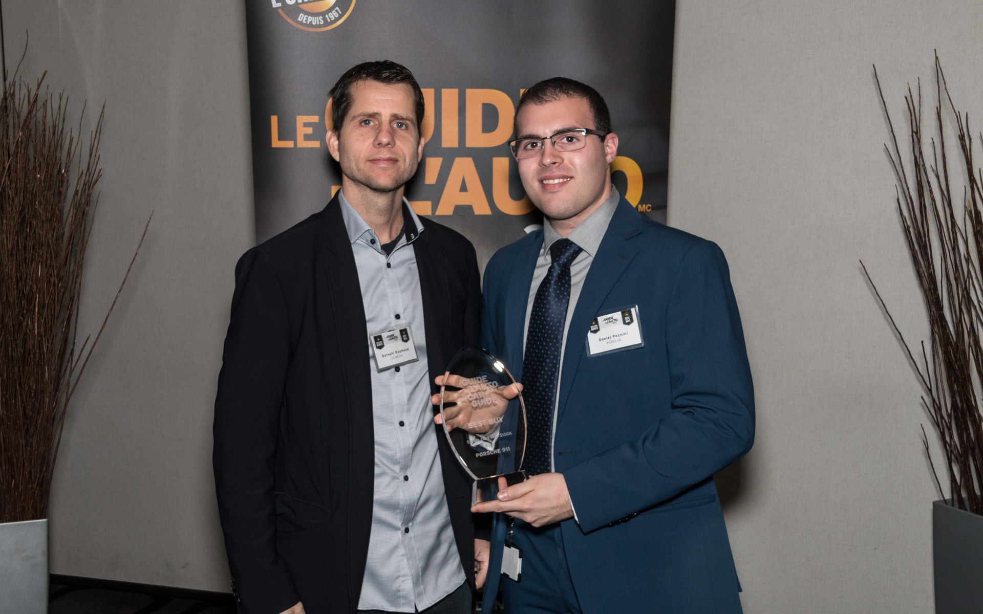 <p>Sylvain Raymond with Daniel Ponzini of Porsche Cars Canada, Ltd.</p>