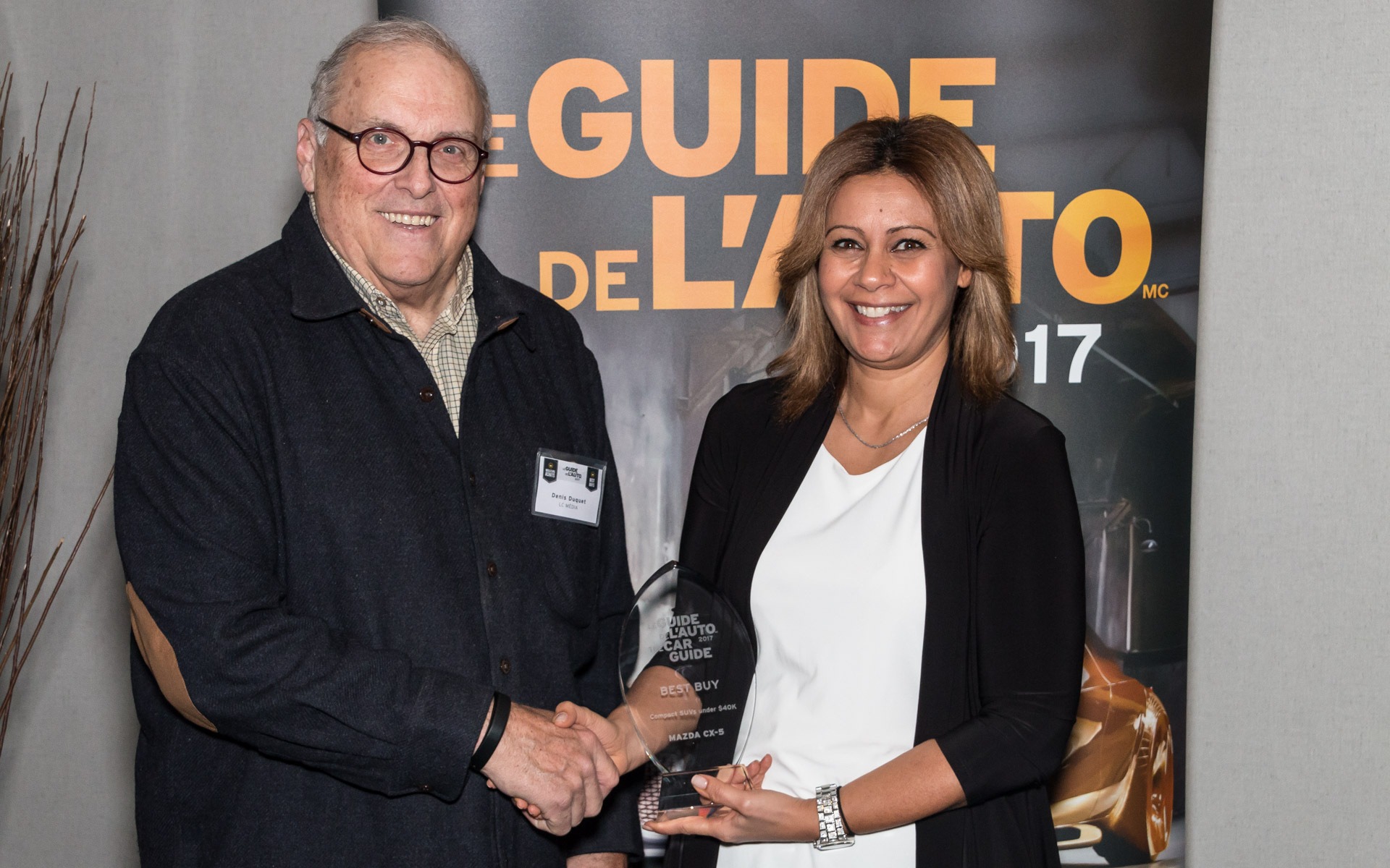 <p>Denis Duquet with Rania Guirguis of Mazda Canada Inc.</p>