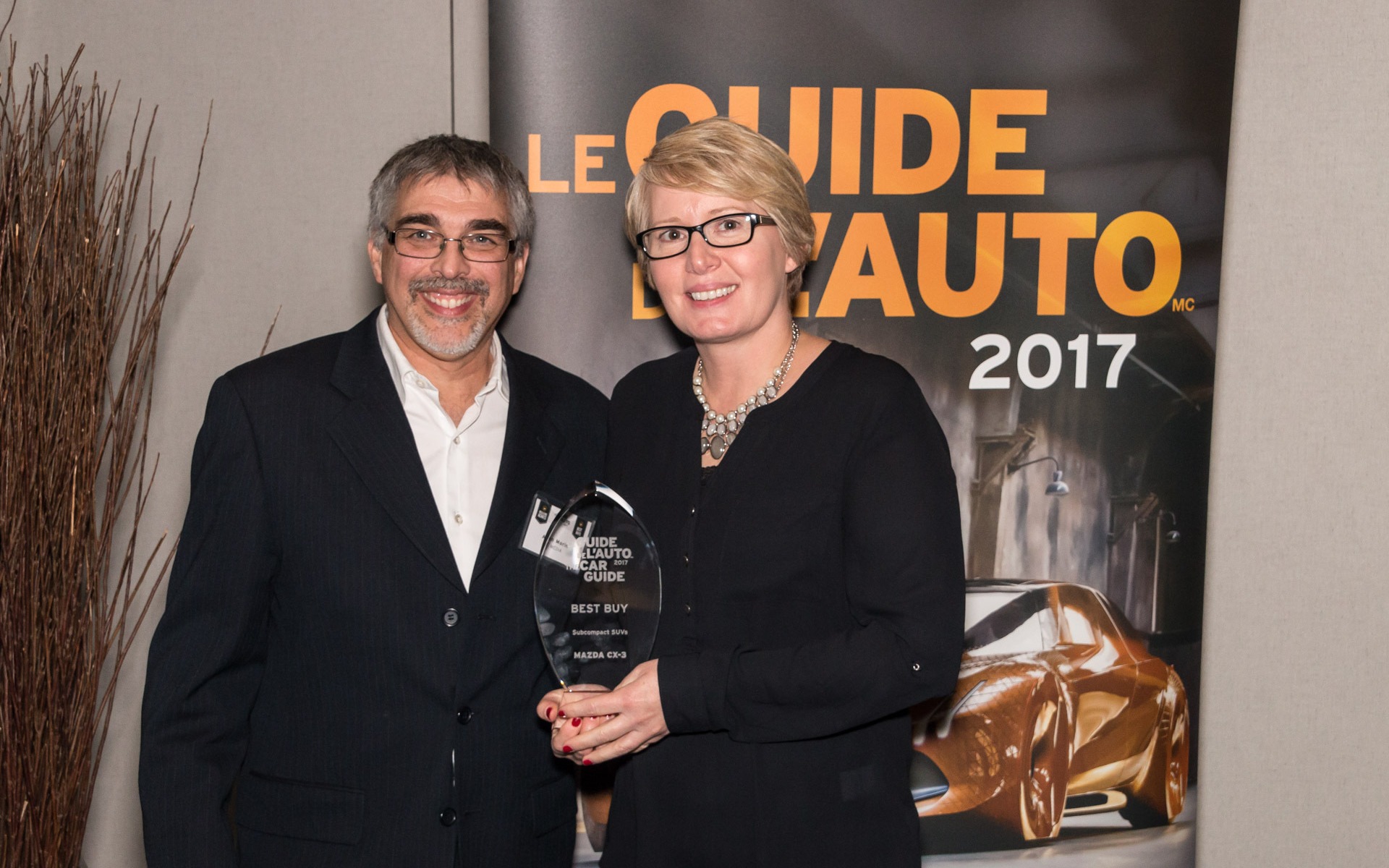 <p>Alain Morin with Sandra Lemaitre of Mazda Canada Inc.</p>