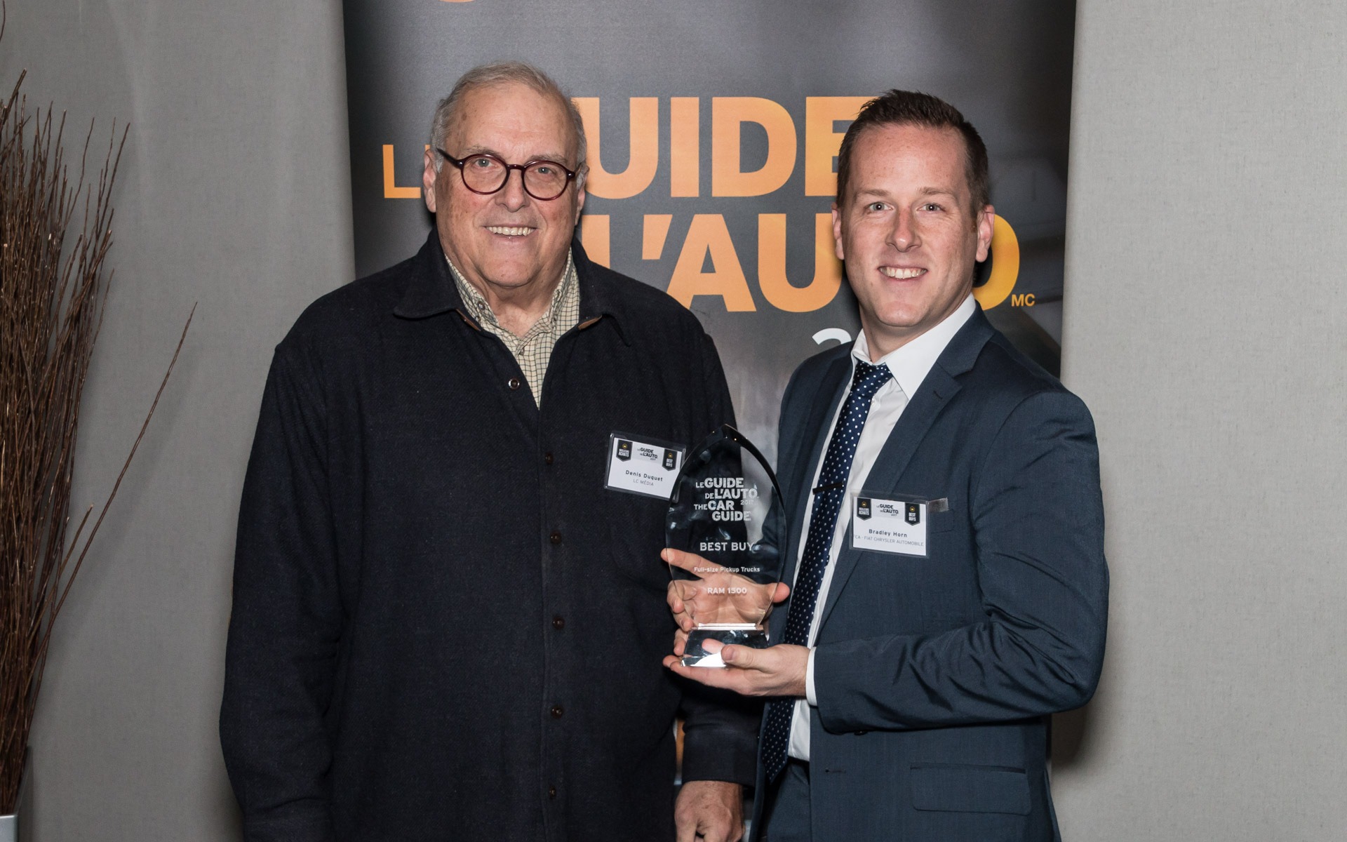 <p>Denis Duquet with Bradley Horn of FCA Canada.</p>