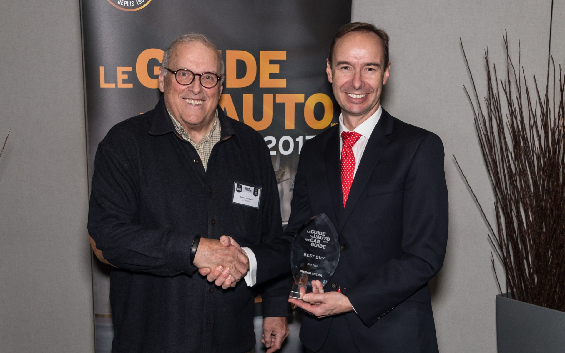 <p>Denis Duquet with Michael Kopke of Nissan Canada Inc.</p>