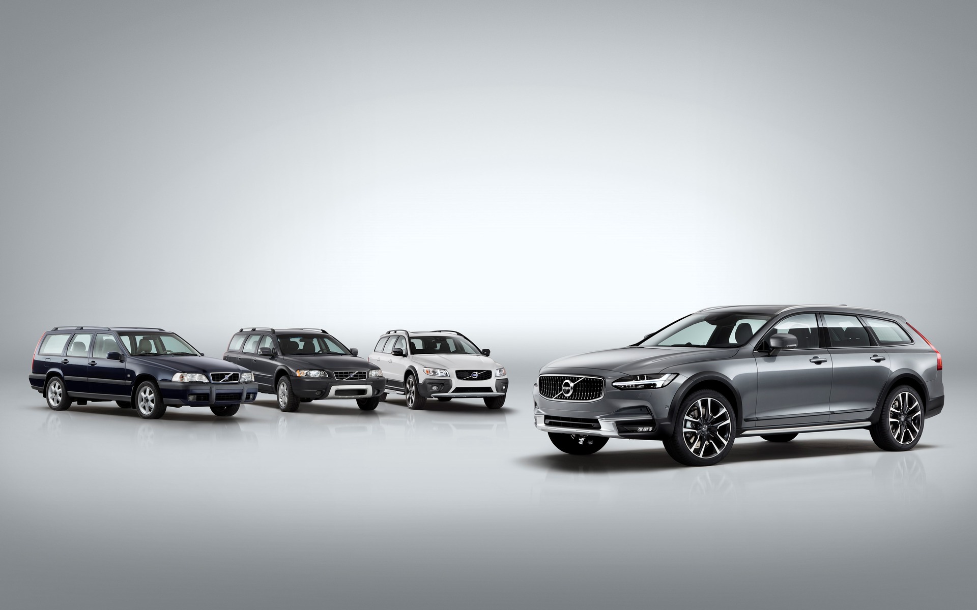 <p>Four generations of the Volvo Cross Country family</p>