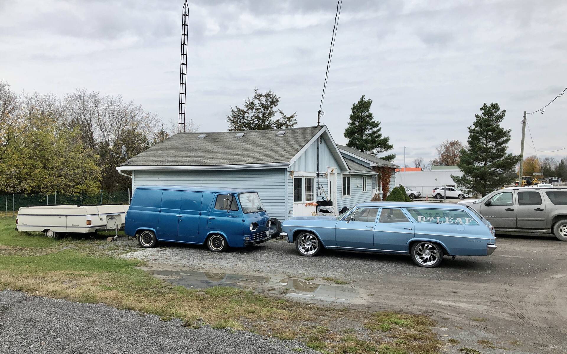 <p>Ford Econoline and Chevrolet Bel Air </p>