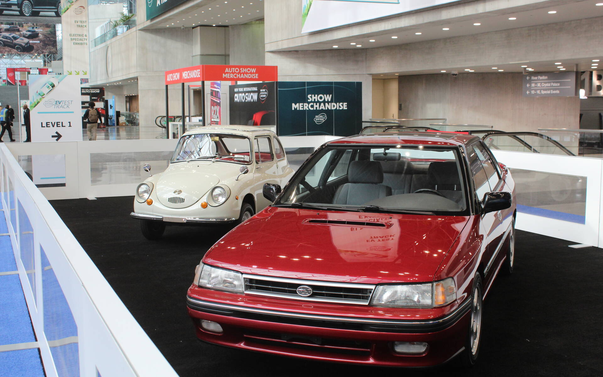 <p>Old Subaru cars including a Legacy</p>