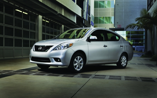 how to turn off tire flat sign in nissan versa 2013